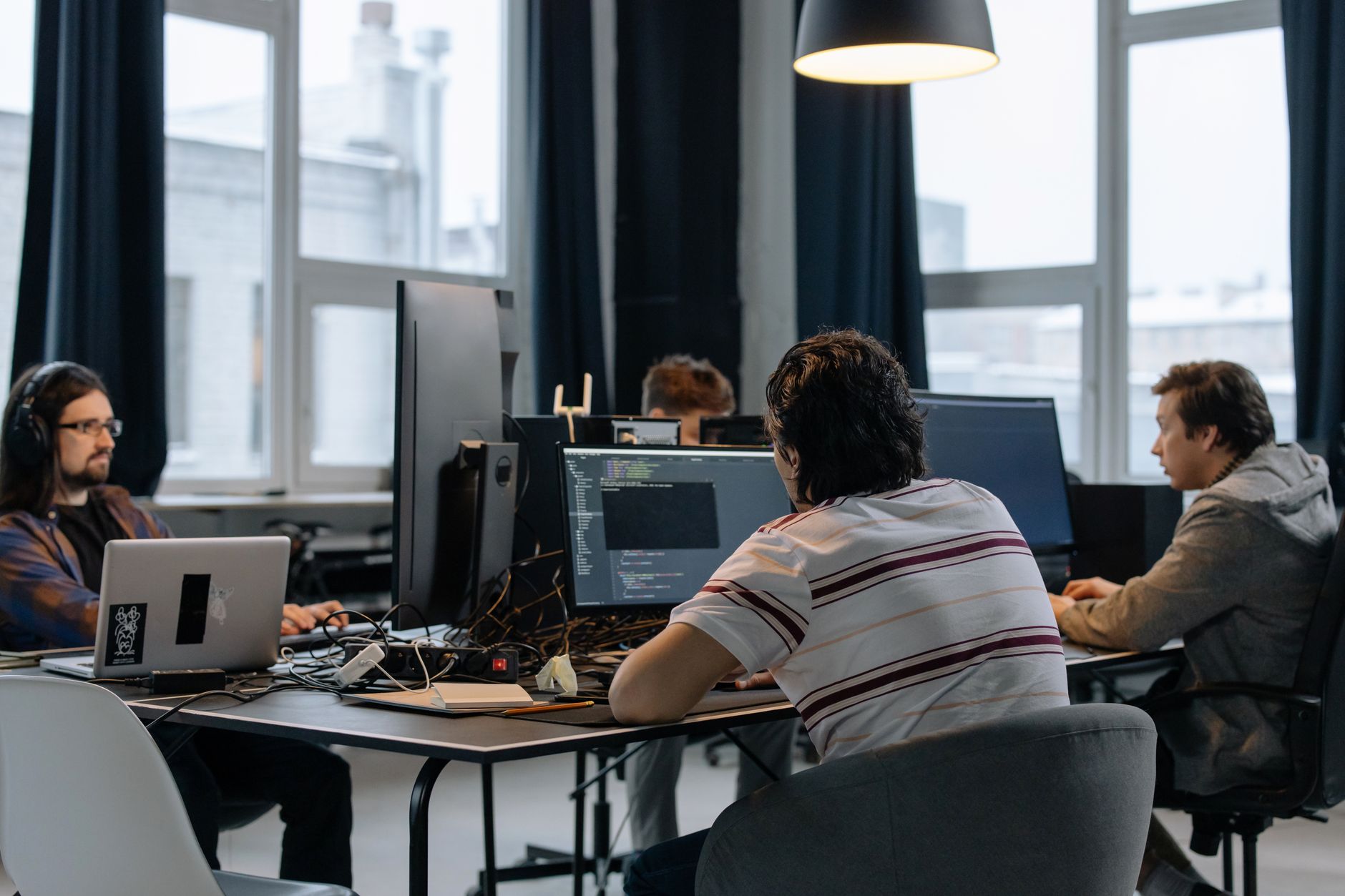 Developers working together in a tech office
