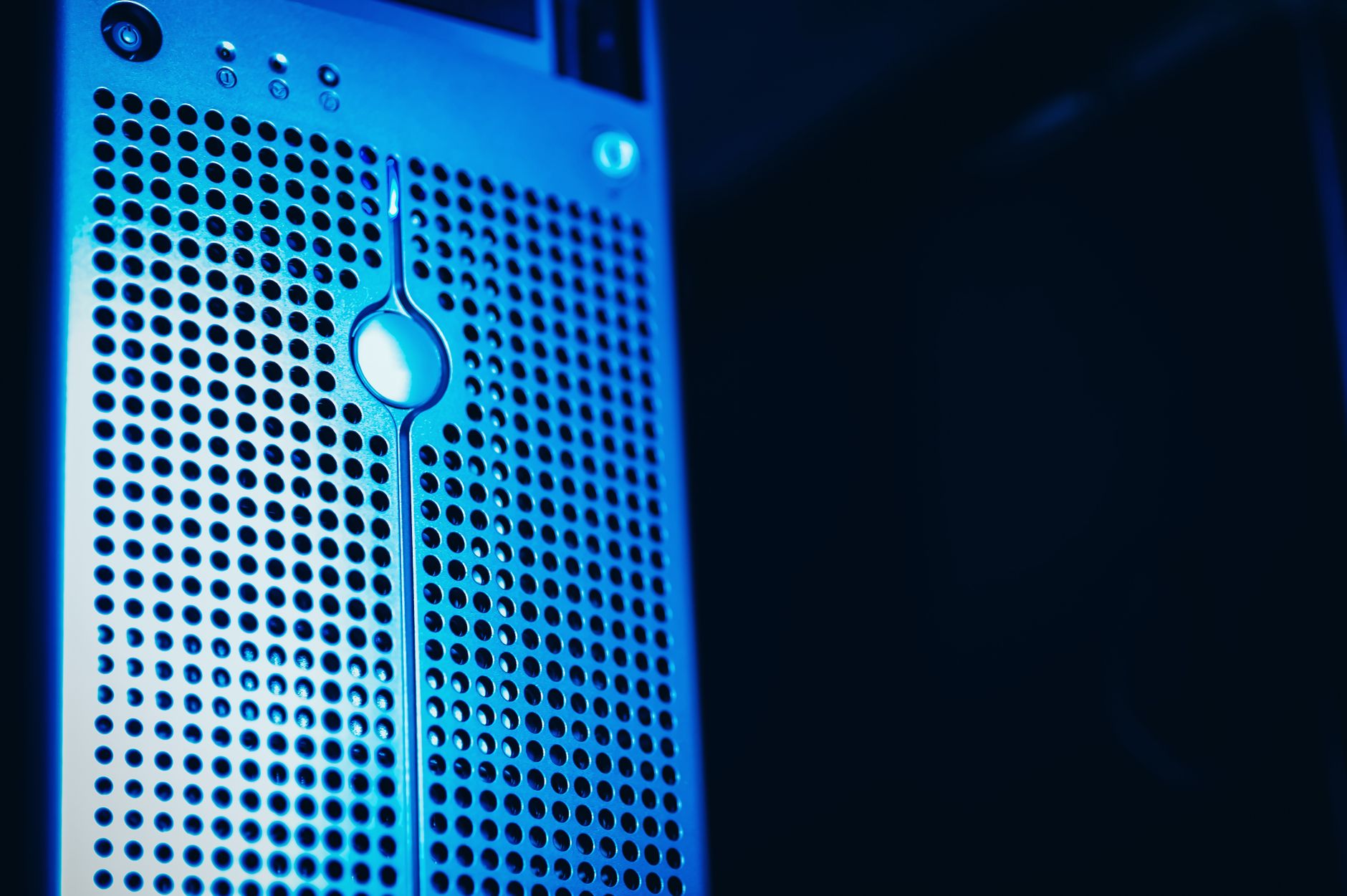 A server rack in blue light, running at night